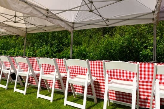 Outdoor event with chairs, tables and tents